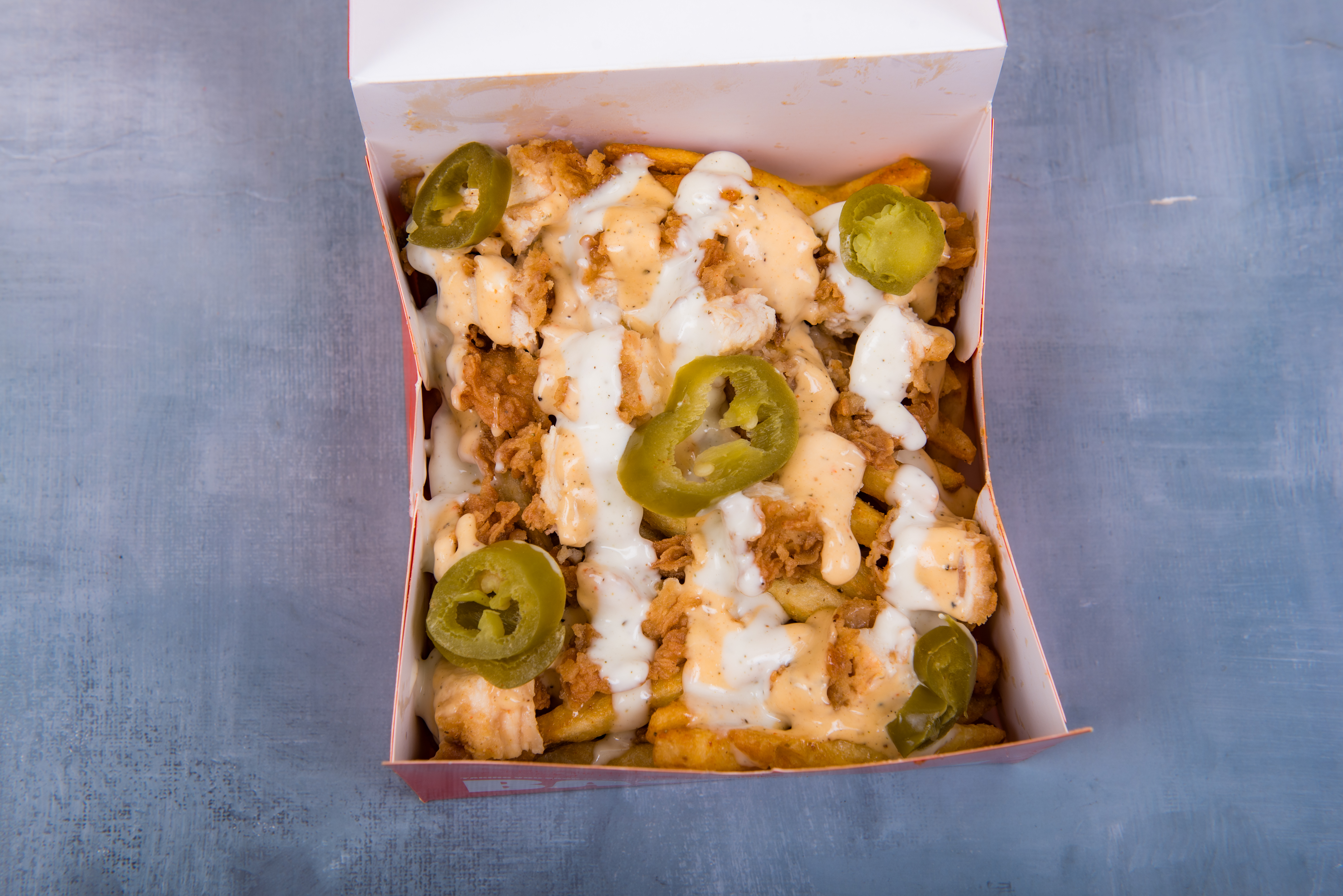 B60 Chicken and Fries — loaded fries with crispy chicken